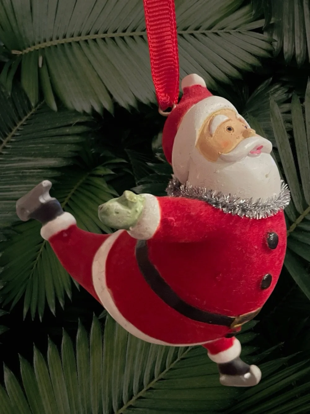 Ice Skating Flocked Santa Christmas Ornament